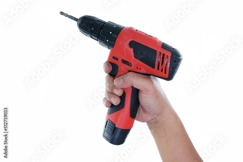 close up right hand holding red cordless drill isolated white background