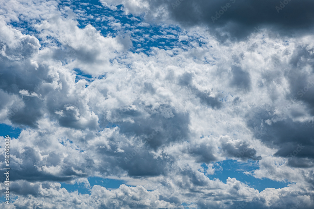 Blue sky with different types of clouds at different altitudes