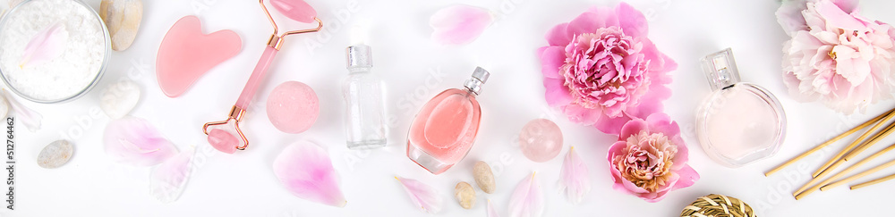 Pink flowers on white background spa facial. Selective focus. Pink flowers on white background spa facial. Selective focus.