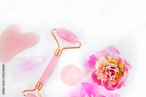 Pink flowers on white background spa facial. Selective focus.