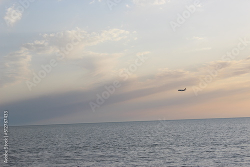plane flying over the sea