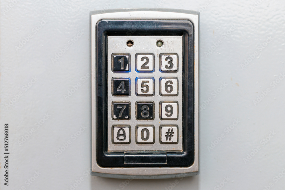 Security device intercom on exterior metal wall of residential building.closeup,copy space. Security device intercom on exterior metal wall of residential building.closeup,copy space.