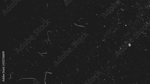 Realistic dust particles on dark background. Abstract animation. White and glow dust particle abstract on black background