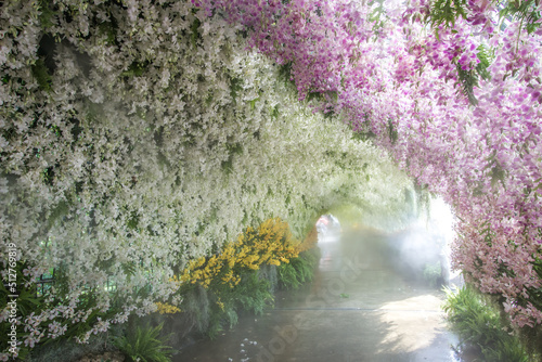 Bang Phae,Ratchaburi province,Thailand on April 13,2019:Beautiful orchid tunnel with fog spray during Songkran Festival at NaSatta Thai Park .