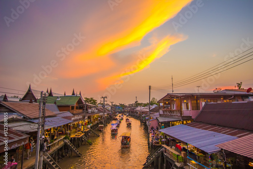 Amphawa district,Samut Songkhram Province,Thailand on April 12,2019:Amphawa Floating Market with beautiful sunset sky
