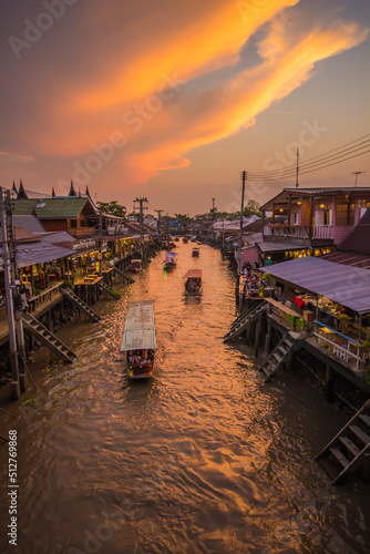 Amphawa district,Samut Songkhram Province,Thailand on April 12,2019:Amphawa Floating Market with beautiful sunset sky