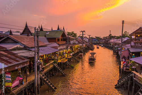 Amphawa district,Samut Songkhram Province,Thailand on April 12,2019:Amphawa Floating Market with beautiful sunset sky