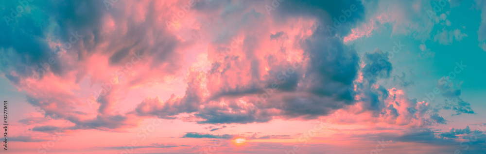 Panorama of a colorful cloudy sky at sunset. Sky texture. Abstract nature background