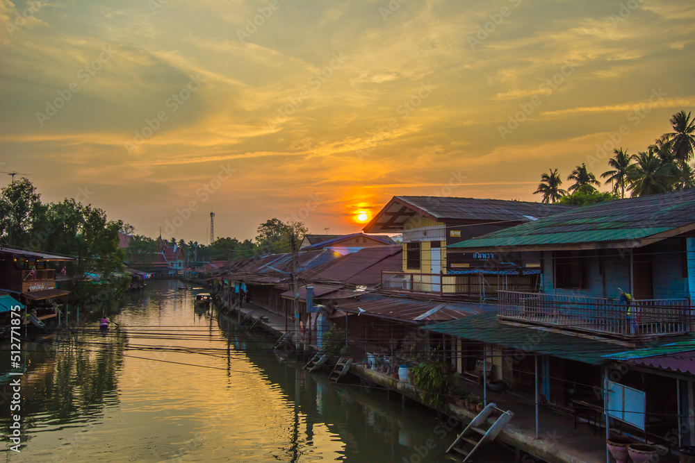 Amphawa district,Samut Songkhram Province,Thailand on April 13,2019:Sunrise in the morning at Amphawa Floating Market. Amphawa district,Samut Songkhram Province,Thailand on April 13,2019:Sunrise in the morning at Amphawa Floating Market.