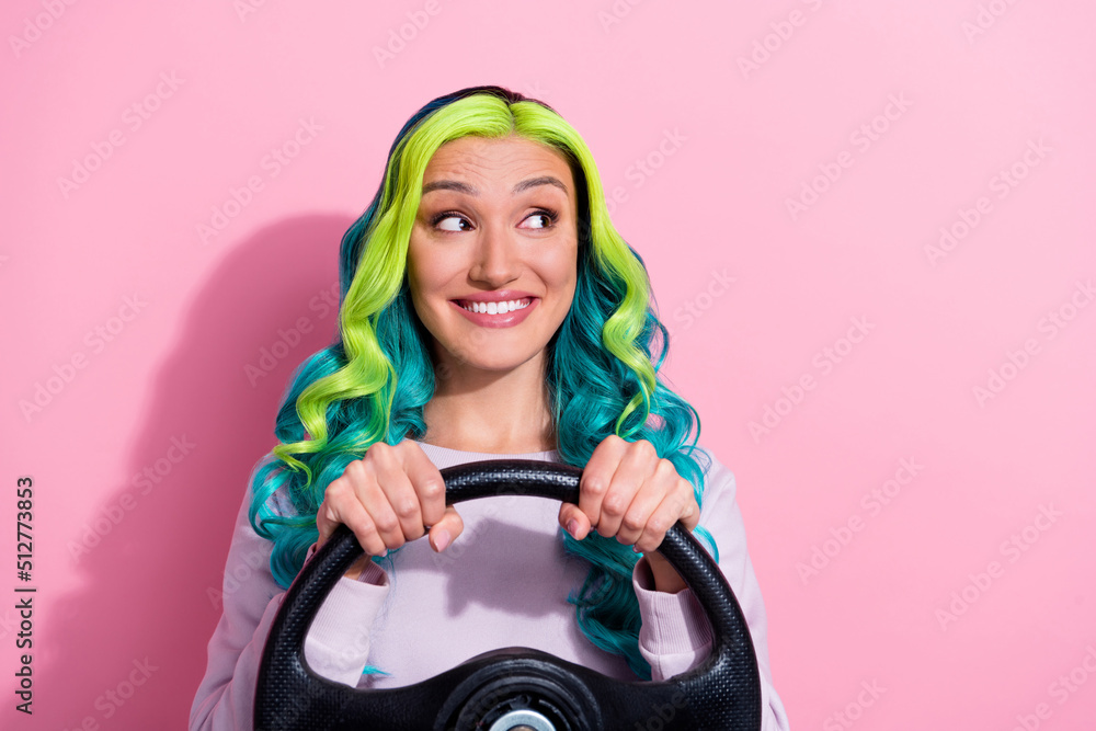 Portrait of adorable charming girl dreaming about new cool car look empty space isolated on pink color background Portrait of adorable charming girl dreaming about new cool car look empty space isolated on pink color background