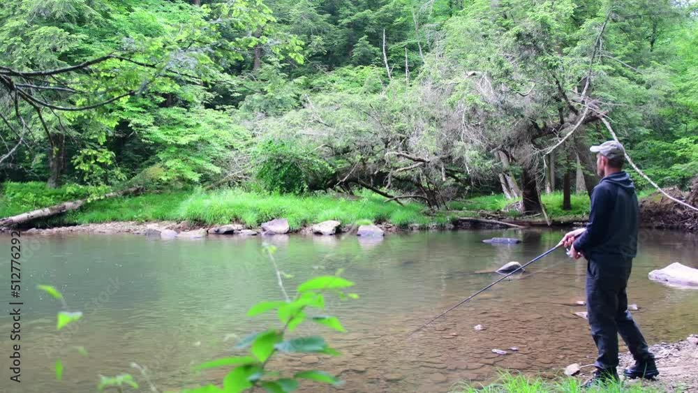 Man shore fishing missed fish right by the bank Man shore fishing missed fish right by the bank