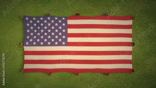 People holding american flag in grass field, aerial view, camera zooming in and out, vintage toned 3D animation in 4K UHD