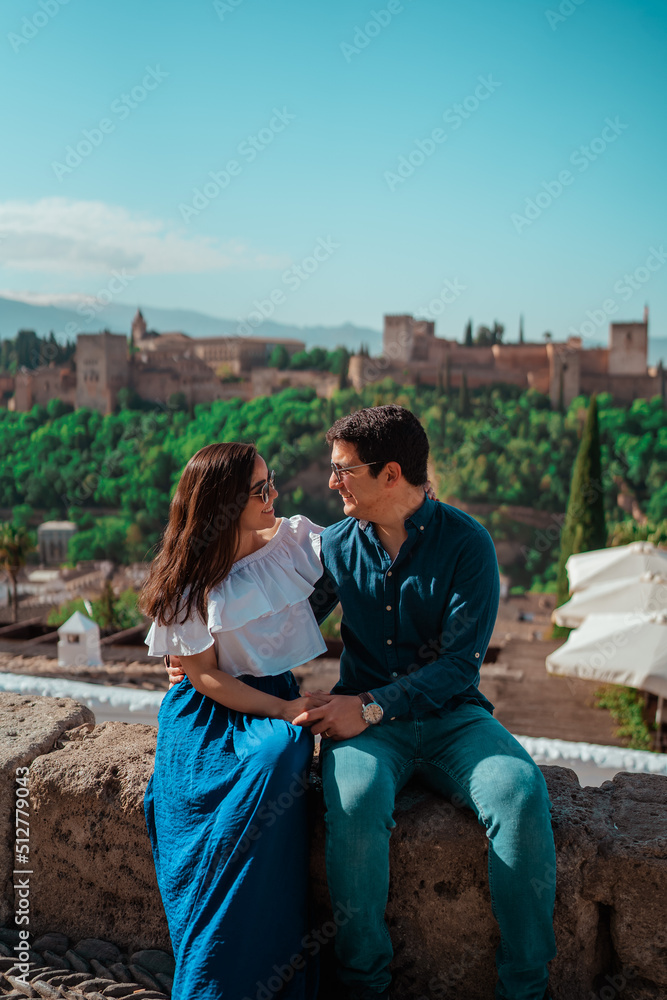 Fototapeta premium beautiful couple in love sitting with nice background