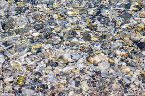 Pebbles in the water on the seashore