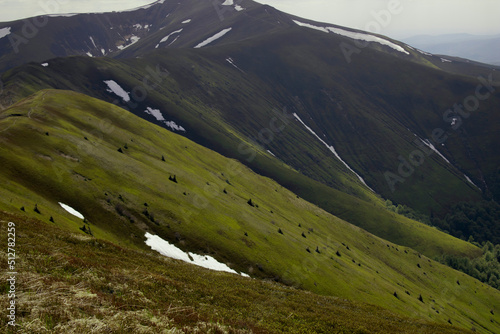 Multi-layered shades on the slopes of the mountains.