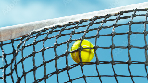 Freeze motion shot of tennis ball hitting the net © Lukas Gojda