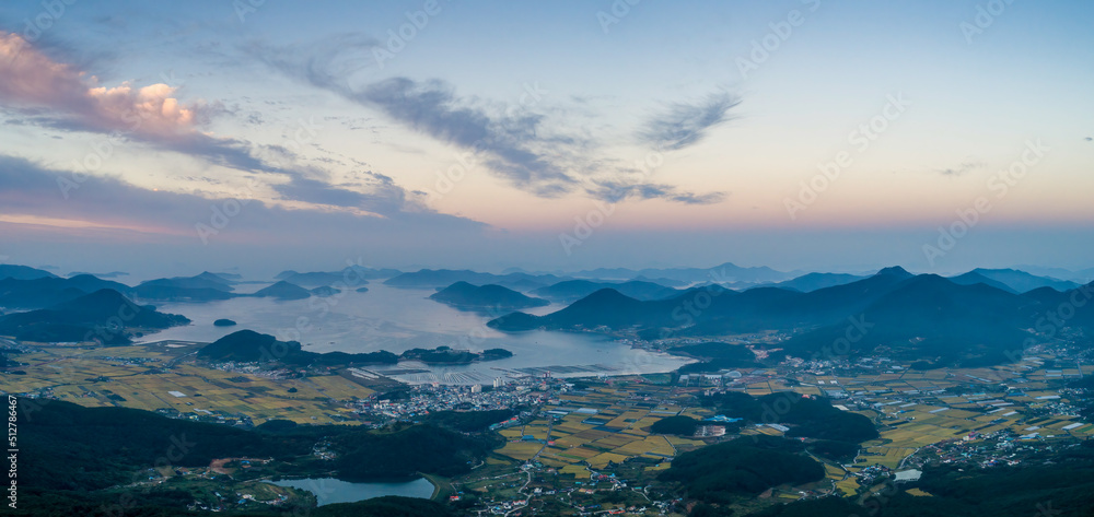 Scenic view of mountains against sky during sunrise Scenic view of mountains against sky during sunrise