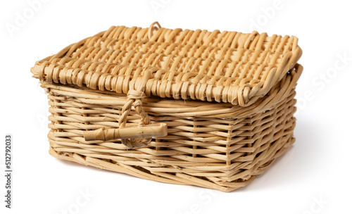 Handmade wicker basket isolated on white background.