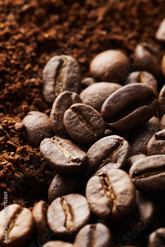 Roasted coffee beans different sort ground and whole close up background