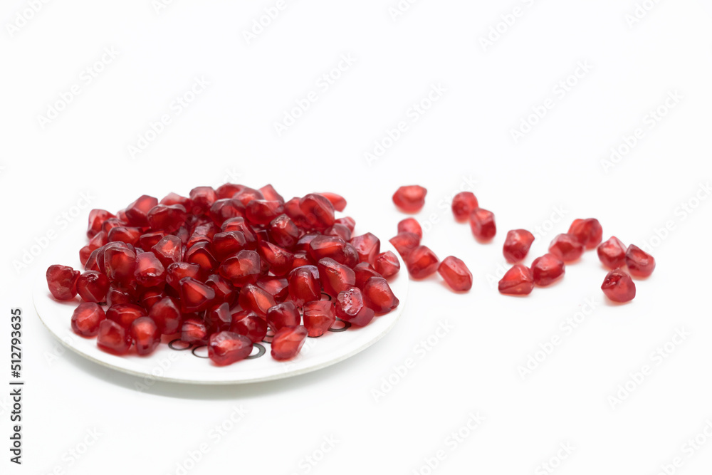 Pomegranate seeds isolated on white background With clipping path. Full depth of field Pomegranate seeds isolated on white background With clipping path. Full depth of field