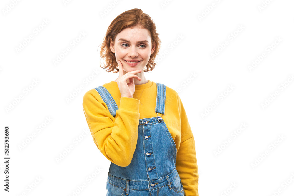 Smart redhead girl in casual holding chin thinks doubts, makes decision isolated on white studio background Smart redhead girl in casual holding chin thinks doubts, makes decision isolated on white studio background