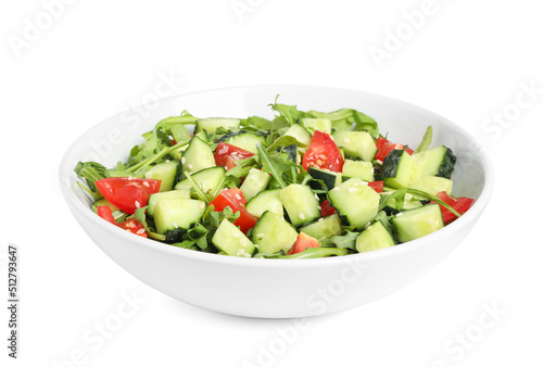 Delicious salad with cucumbers, tomatoes and sesame in bowl isolated on white