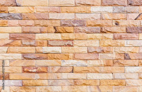 Brown brick wall texture with rough pattern Wallpaper background. Brick wall.