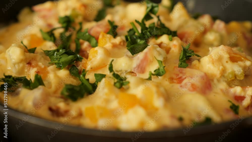 Preparing vegetables omelette on frying pan Preparing vegetables omelette on frying pan