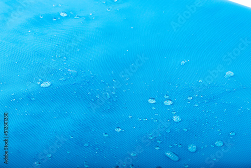 Water repellent fabric  waterdrops on blue waterproof surface