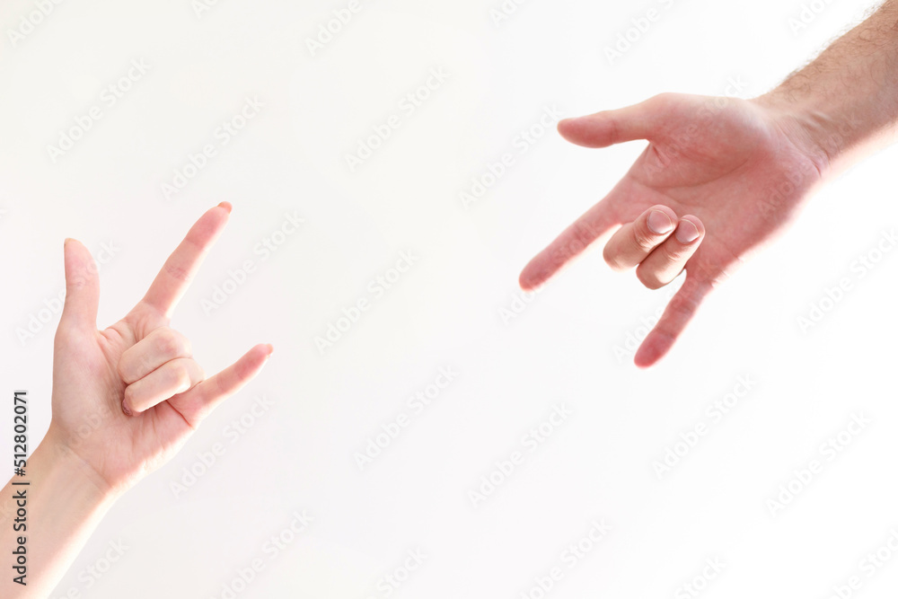 rock sign male and female hand on isolated background rock sign male and female hand on isolated background