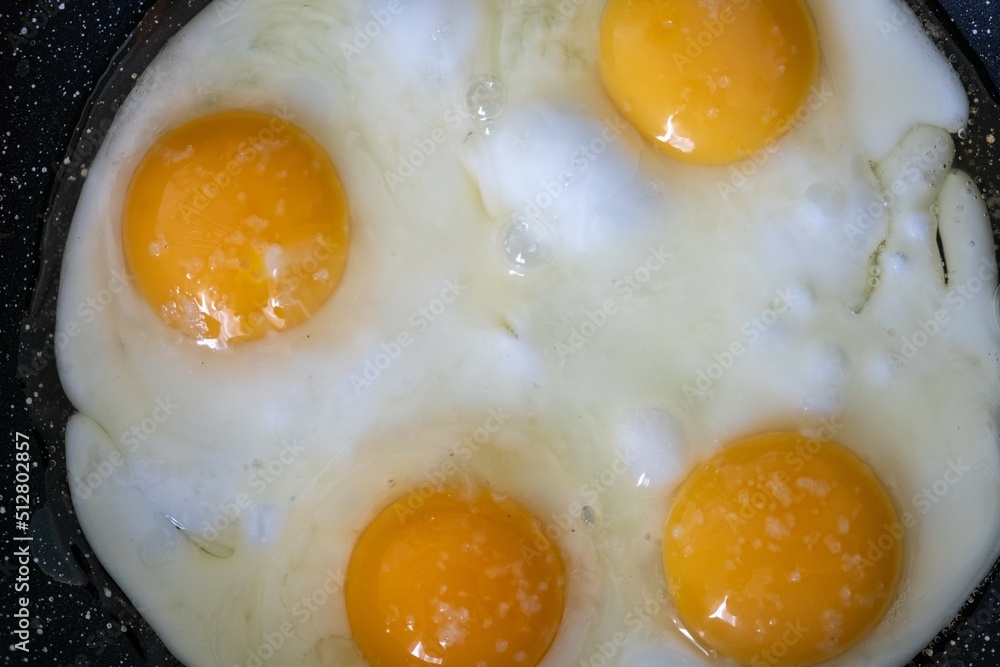 Egg fried meal cooking breakfast. fat cooked Egg fried meal cooking breakfast. fat cooked
