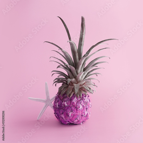 abstract photo of neon pink pineapple. Holidays, beach and tropical theme