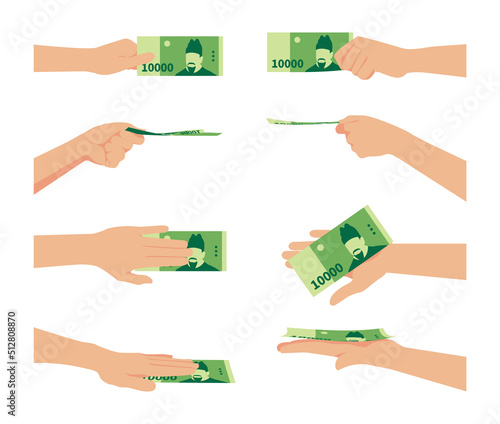 Korean currency, illustration of holding money in hand. South Korean money 10,000 won.