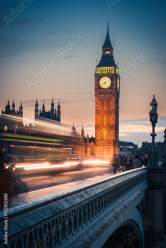 Big Ben at Dusk, London. An early evening view over Westminster Bridge and Big Ben. Long exposure with intentional motion blur of passing traffic.
