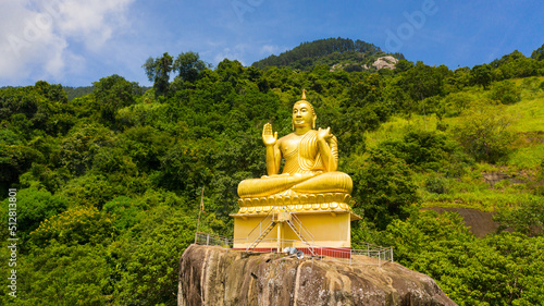 Buddha statue, Seated Buddha on rock, Aluvihara Rock Temple, Matale, Central Province, Sri Lanka, Asia.