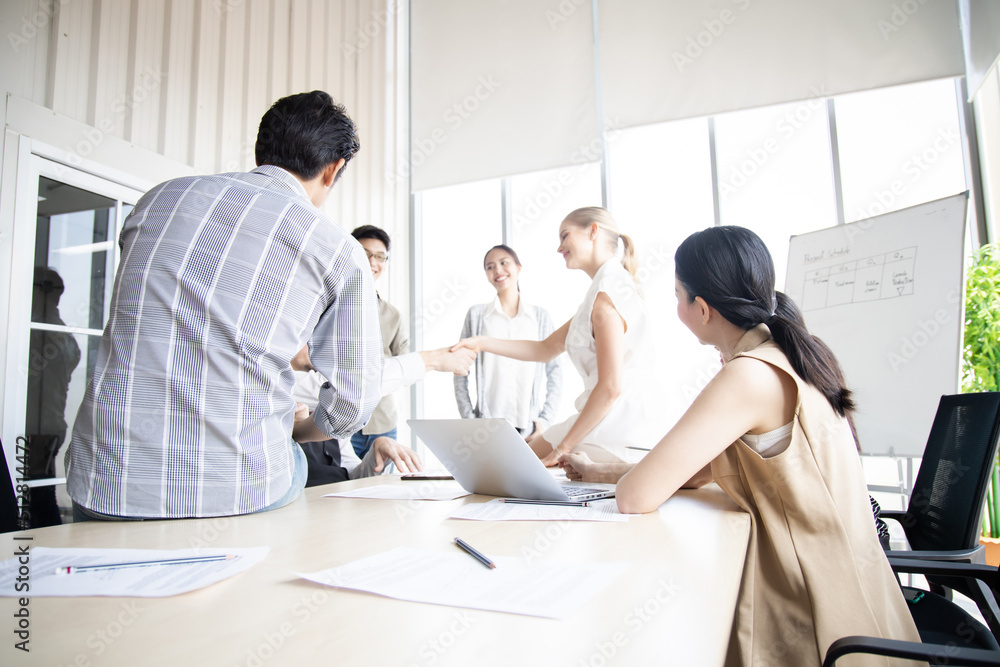 Success of business people team with handshake. Success of business people team with handshake.