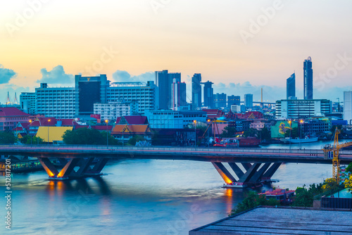 Khlong San,Bang Rak,Sathorn,Bangkok,Thailand on February 19,2019:King Taksin Bridge(Sathorn Bridge) and Bangkok skyline in early morning. photo