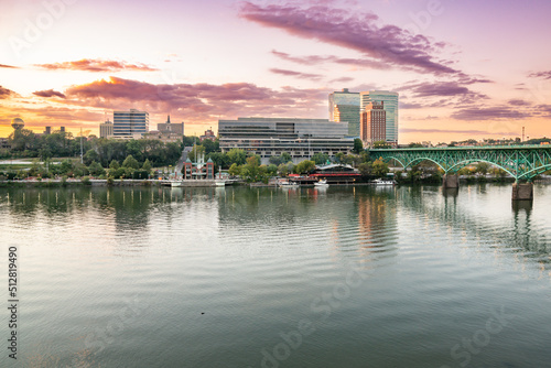 The city skyline of Knoxville along the Tennessee River at sunset © pabrady63
