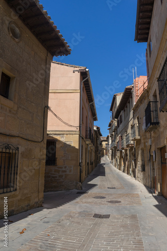 Walking through narrow streets with blue sky in Tafalla, Navarra, Spain, Sapin