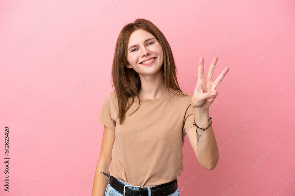 Young English woman isolated on pink background happy and counting three with fingers Young English woman isolated on pink background happy and counting three with fingers