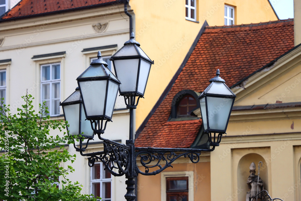 Colorful historical buildings and vintage street lantern in central Zagreb, Croatia.