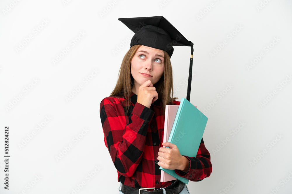 Young English student woman isolated on white background and looking up Young English student woman isolated on white background and looking up