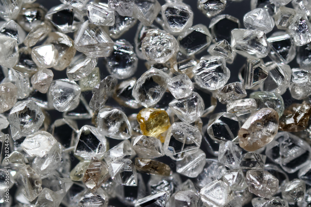 Closeup a pile of natural rough diamond crystal
Closeup a pile of natural rough diamond crystal