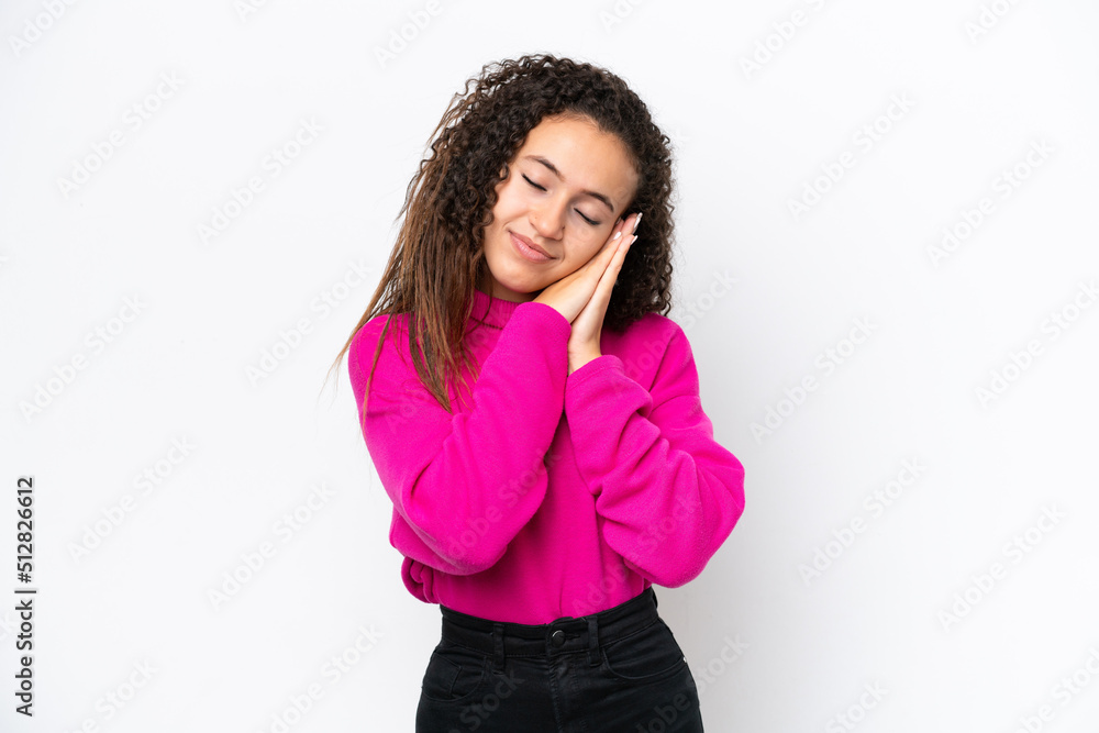 Young Arab woman isolated on white background making sleep gesture in dorable expression Young Arab woman isolated on white background making sleep gesture in dorable expression