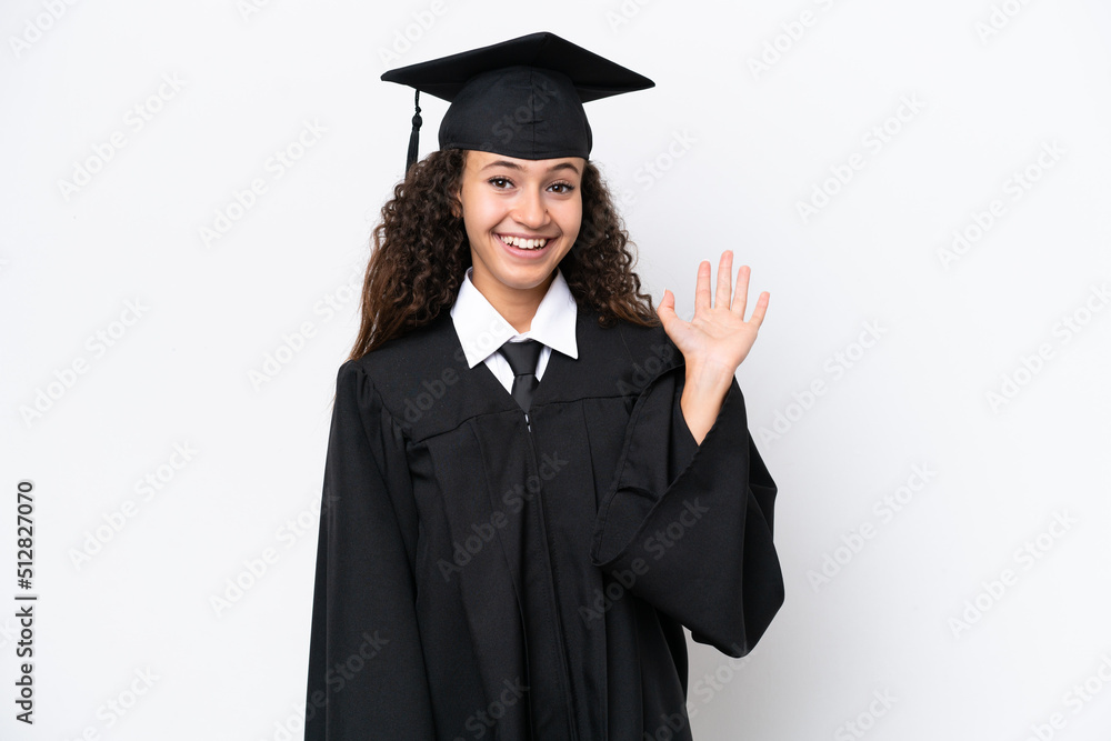 Young university graduate Arab woman isolated on white background saluting with hand with happy expression Young university graduate Arab woman isolated on white background saluting with hand with happy expression