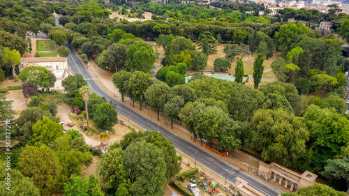 Aerial view of Villa Borghese, a landscape garden in Rome, Italy. In the park there are  buildings, museums and attractions. photo