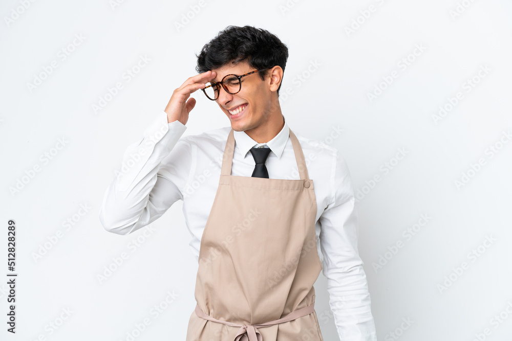 Restaurant Argentinian waiter isolated on white background laughing Restaurant Argentinian waiter isolated on white background laughing