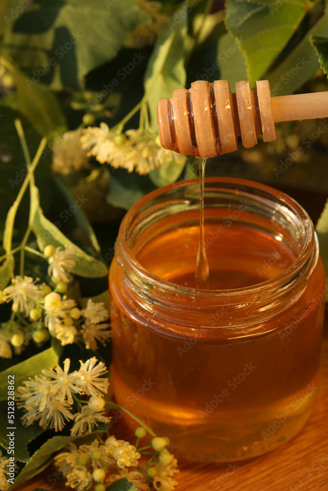 jar of linden honey with linden blossom jar of linden honey with linden blossom