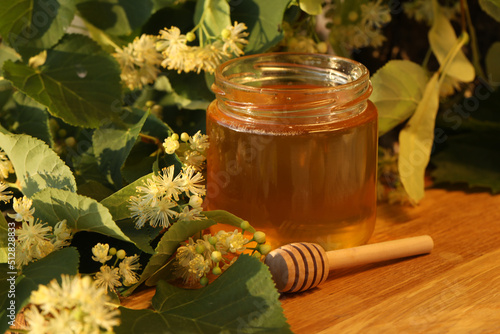 jar of linden honey with linden blossom