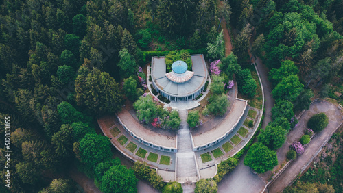 Aerial view of The Monumental Cemetery of Craviolo, in the Province of Biella, Piedmont, Italy. Semicircular architecture plan. Building surrounded by nature.